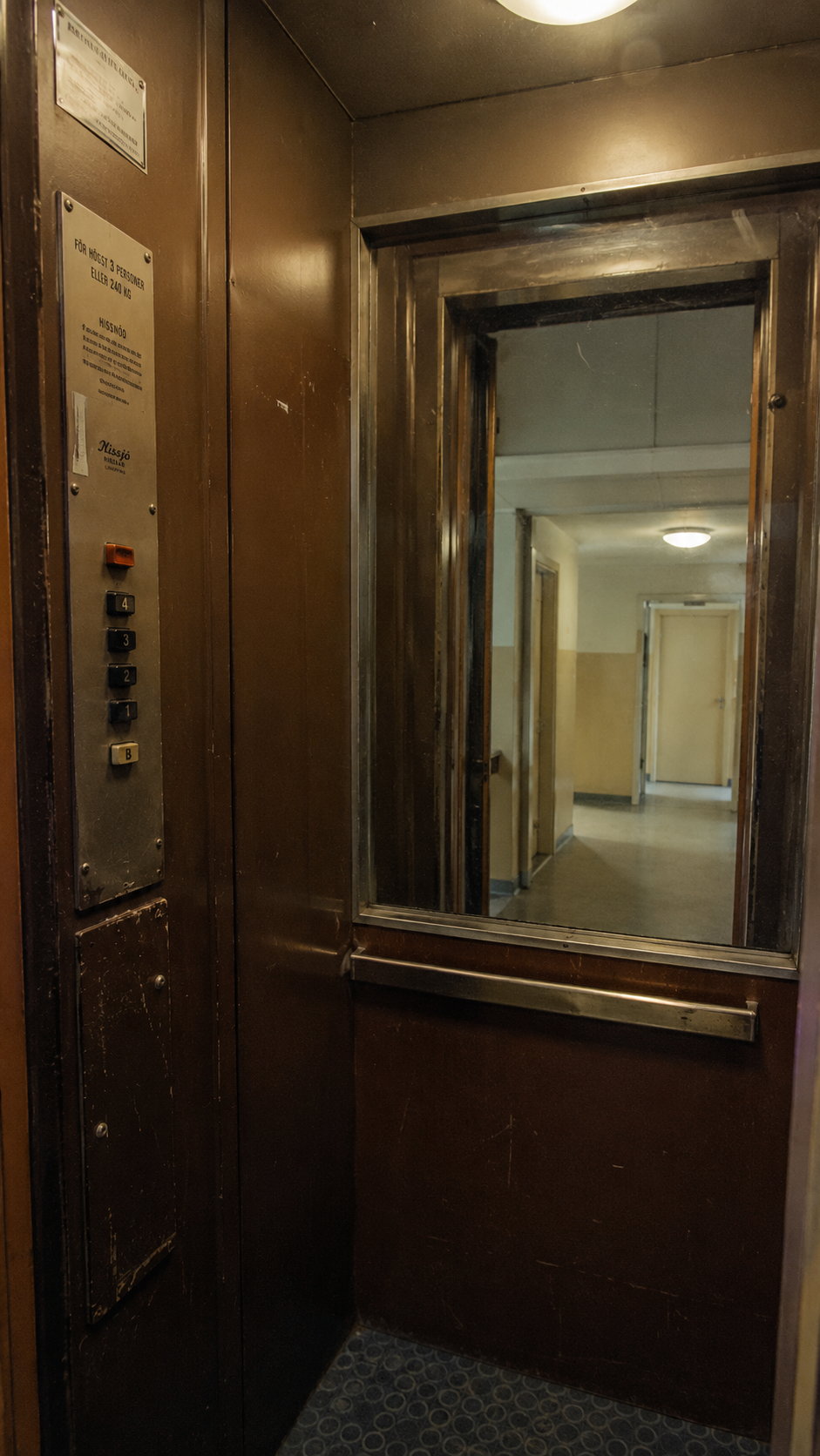 Recovered elevator interior photograph marked access point B.